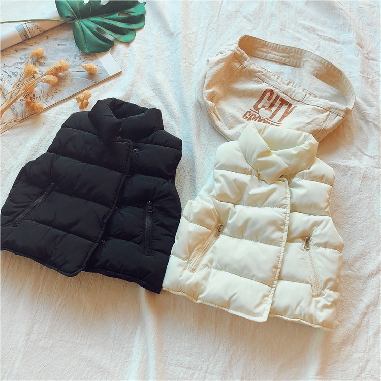 Trẻ em đứng cổ áo zip túi vest Trẻ em mặc 2018 mùa đông mới bé trai và bé gái màu rắn dày áo gile lông mẹ và bé