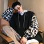 2018 mới kẻ sọc khâu áo trùm đầu giả áo len hai mảnh áo len nam xu hướng phiên bản Hàn Quốc của áo len lỏng thoi trang nam cao cap