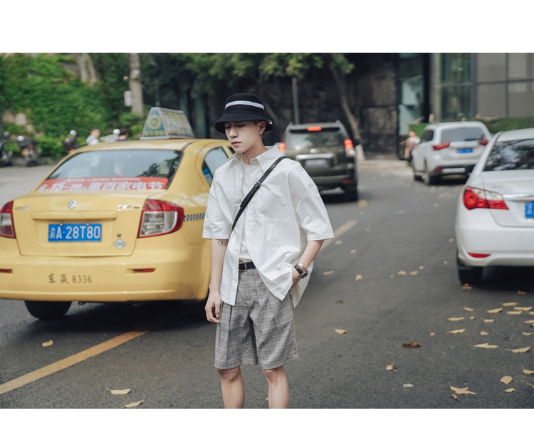 Phong cách hàn quốc sang trọng kẻ sọc quần short nam thanh niên mùa hè lỏng quần thẳng năm điểm quần quần thủy triều giản dị quần nam