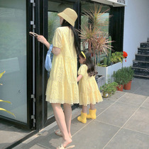 Net red parent-child dress summer 2021 New Korean fashion loose seaside mother and daughter hollow princess dress foreign atmosphere