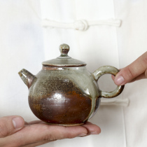 Solitary hand-made firewood-fired teapot pure hand-held kung fu tea set coarse pottery antique tea maker single pot grass and wood glaze