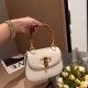 Dongsheng niche design retro bamboo bag 2022 new women's bag messenger shoulder portable mini saddle bag