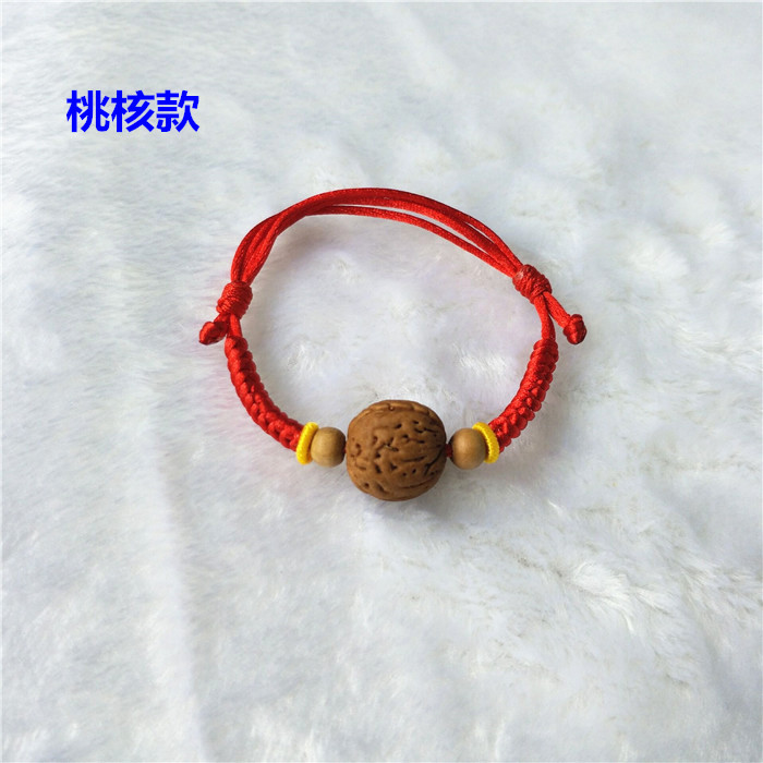 Em bé ác quỷ giật vòng tay giỏ đào xương lợn đào quả óc chó dây đỏ trang sức vòng chân em bé - Vòng chân những mẫu lắc chân đẹp nhất