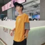 Bf phong cách cá tính theo xu hướng nam giới quần áo trẻ trung lỏng lẻo hip hop tay áo rộng bảy điểm tay áo ngắn tay áo áo thun nike