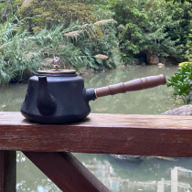 Side take the iron jug Japanese style cast iron teapot without coating southern iron jug hand ironware retro-cooked tea boiling kettle tea set