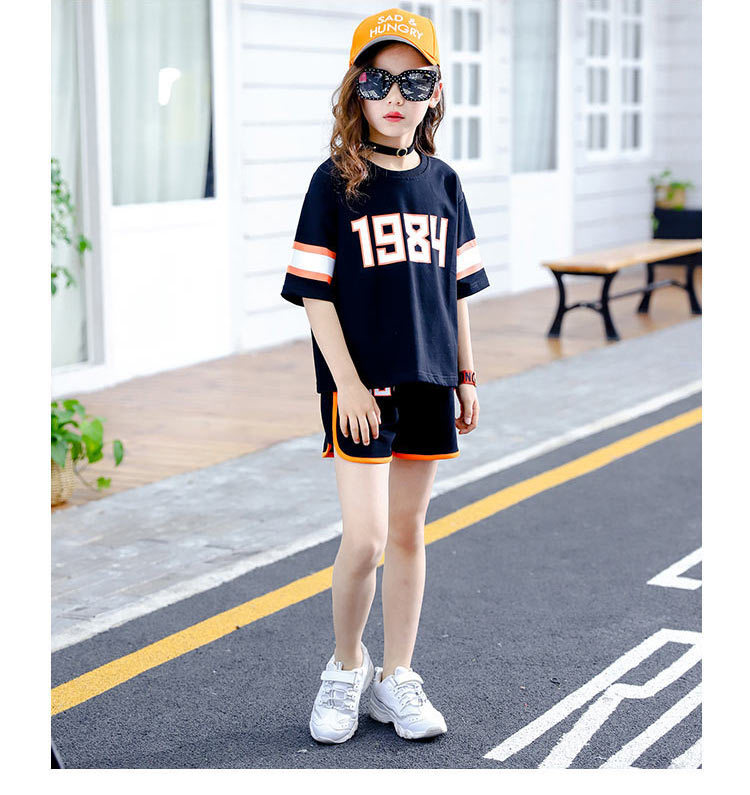 Bộ đồ bé gái giản dị 2018 hè mới phiên bản Hàn Quốc của các chàng trai bảnh bao, quần lửng tay lửng ngắn hai dây thể thao quần jean trẻ em
