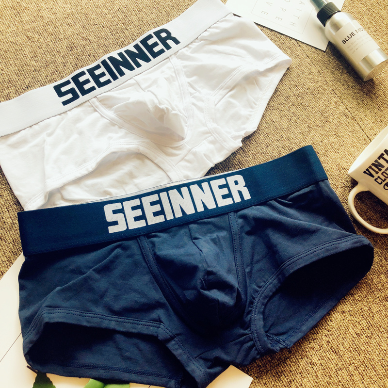 Tide đồ lót nam cotton thấp eo gợi cảm trẻ trung thanh niên màu rắn thoải mái thể thao boxer trắng đồ lót quan lot nu dang dui