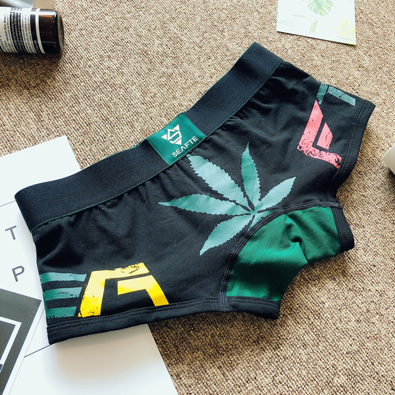 Chất liệu cotton nam Boxer Tóm tắt Thanh niên Cotton Cá tính Maple Leaf Quần short gợi cảm Đầu thấp Quần bó Quần thể thao quan lot khe nam