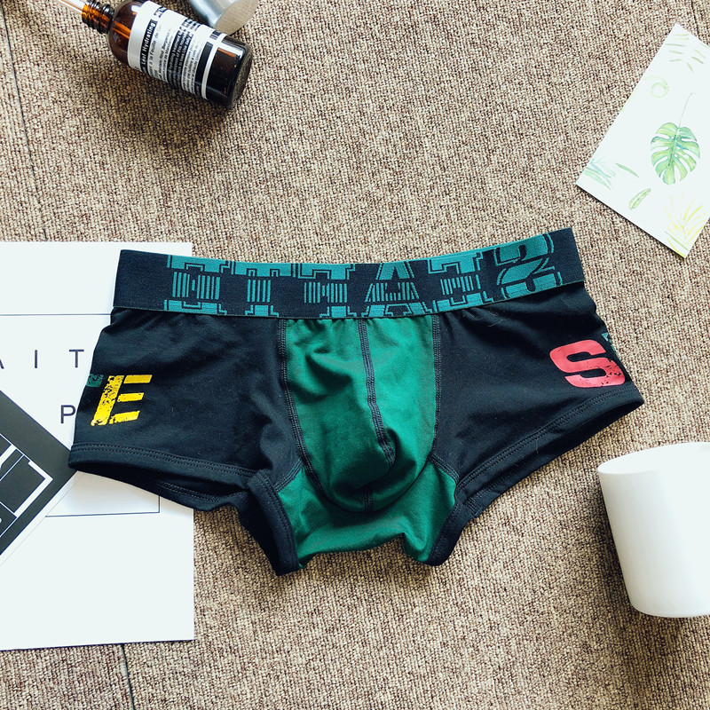 Chất liệu cotton nam Boxer Tóm tắt Thanh niên Cotton Cá tính Maple Leaf Quần short gợi cảm Đầu thấp Quần bó Quần thể thao quan lot khe nam