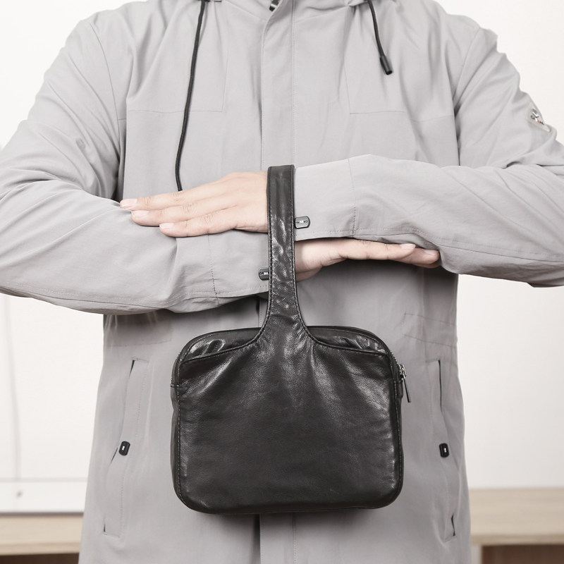 Male and female co-dermis Handheld handbag Wrist Bag Containing Bag Mountain Goat Leather Handbag Original Design
