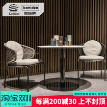 Outdoor furniture courtyard table and chair creative rattan chair three-piece model room balcony table and chair designer rattan leisure chair