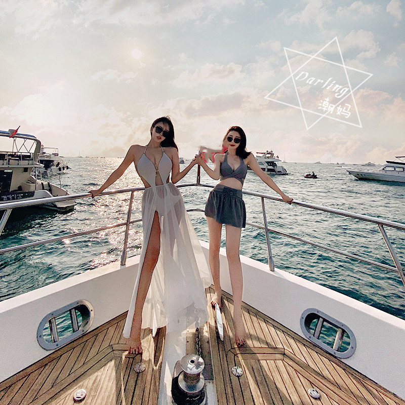 Original high-end European and American long skirt bikini eye-catching hollow sexy backless hot hanging neck one-piece swimsuit women's two pieces