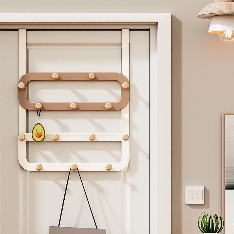 Hook behind doors hooked up on modern bedroom walls with open-door clothes hanging on door hook