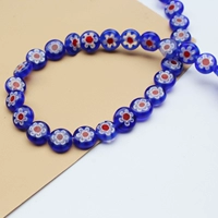 Сапфир сине-красный с сердцевиной 8 мм, около 44 штук.