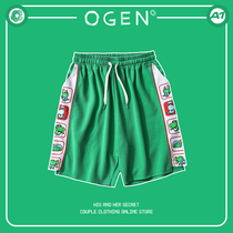 OGEN CLUB21SS tide brand men and women with the same loose row of small dinosaur sports casual shorts