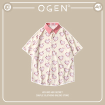 OGEN CLUB21SS tide brand men and women with the same loose full body red heart print POLO collar short-sleeved shirt