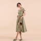 TANSSHOP cross strapless one-word collar sisters bridesmaid dress with pockets and big swing to show thin mid-length skirt dress