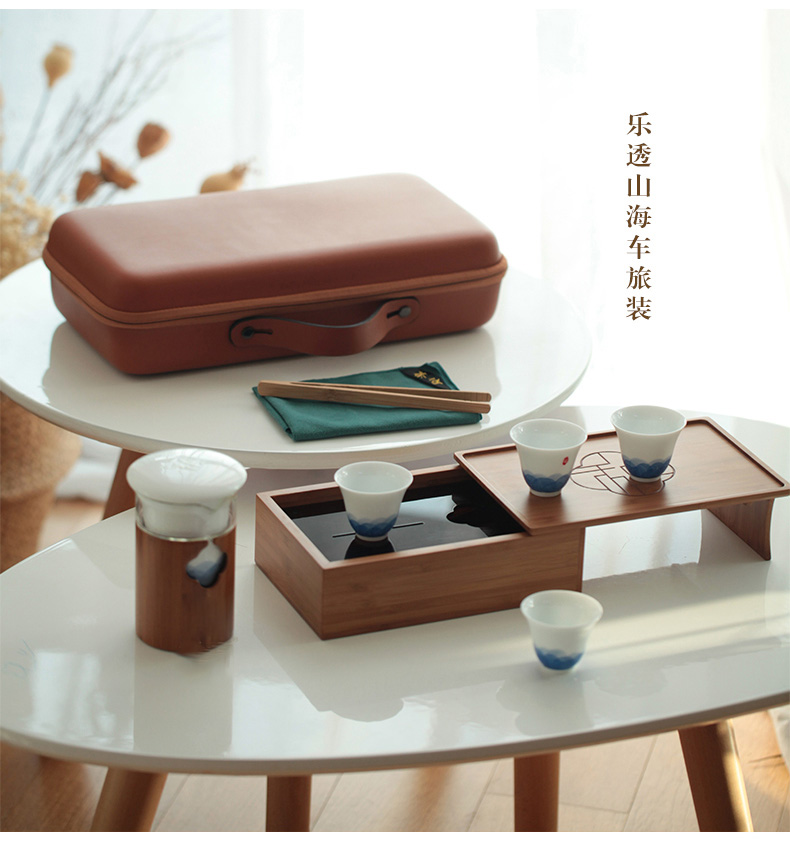 Travel kung fu tea set the set of on - board, portable Japanese hand - made ceramic pot of four cups of is suing a bag