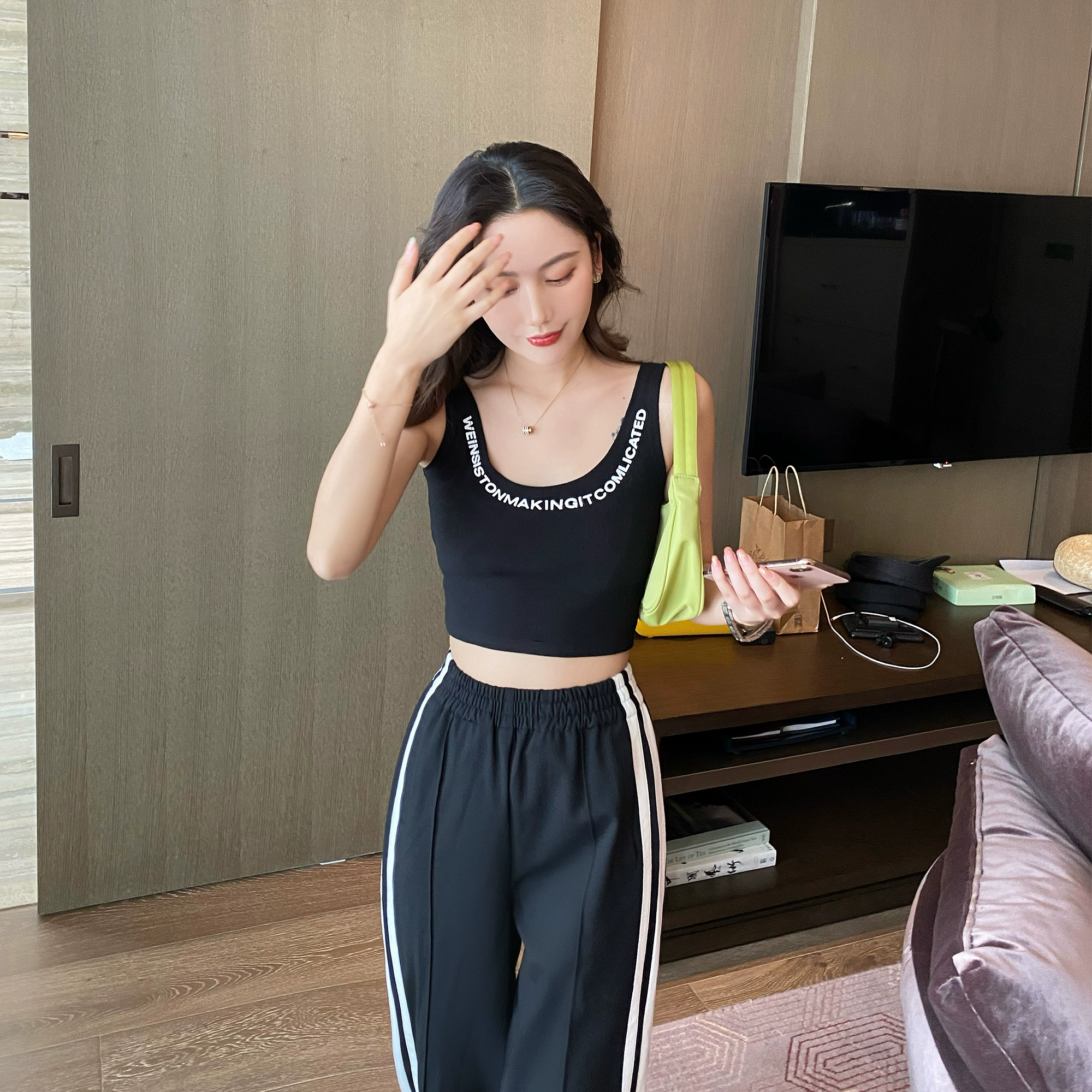 Áo vest thể thao nữ mặc theo phong cách Xuân Ya làm đẹp lưng cao eo ngắn khoét rốn và in áo crop top - Áo ba lỗ