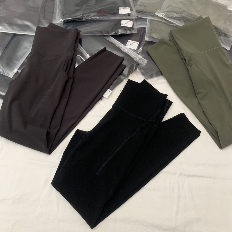 Wuxin Pocket Cloud Feel Nine-Point Leggings for Women 2026 Spring No T-Line Elastic Slimming Yoga Pants Thin Style 7578