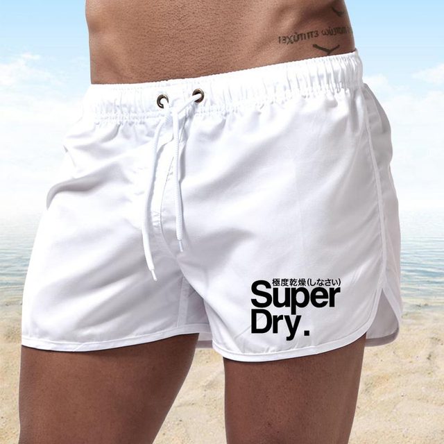 superdry ຜູ້ຊາຍຫາດຊາຍສັ້ນອອກກໍາລັງກາຍກິລາ pants ສັ້ນ surf ສາມໄຕມາດຂອງຜູ້ຊາຍ