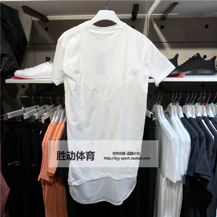 Adidas chính hãng adidas clover áo thể thao nữ cổ tròn giản dị váy ngắn tay CE4133 - Trang phục thể thao quần đùi thể thao nữ