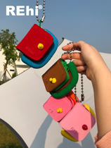 Pick up Rehi Ding and relax original earphone bag airpods protective cover Apple earphone case on the ground