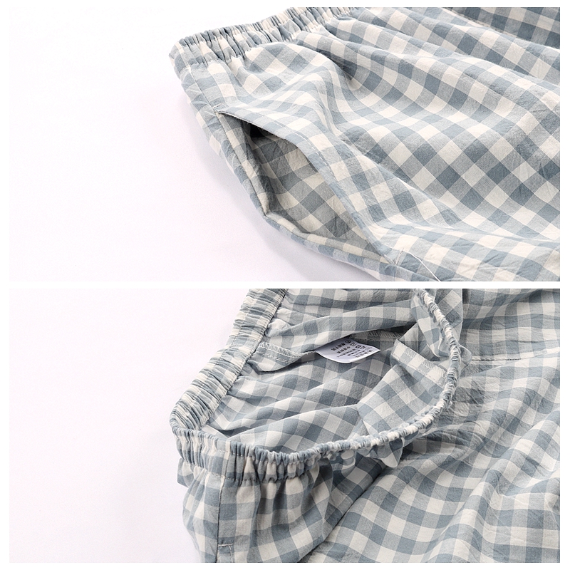 Bộ đồ ngủ cotton tinh khiết mùa xuân và mùa thu đôi mỏng kẻ sọc quần nam và nữ cotton thường rộng kích thước lớn có thể mặc bên ngoài quần nhà quần thun nam