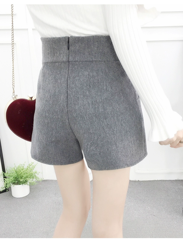 Quần short len ​​nữ ống rộng phần ngắn Phiên bản Hàn Quốc của mùa thu và quần mùa đông eo cao giản dị mỏng màu đen mặc quần ống rộng phụ nữ