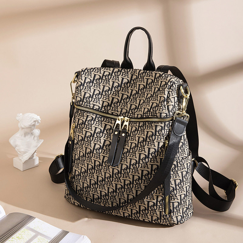 French official Caring Koko letter canvas backpack fashion school bag leather anti-theft backpack women