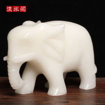 Natural white marble elephant ornaments in the flowing water attract money like decorative crafts attract money feng shui