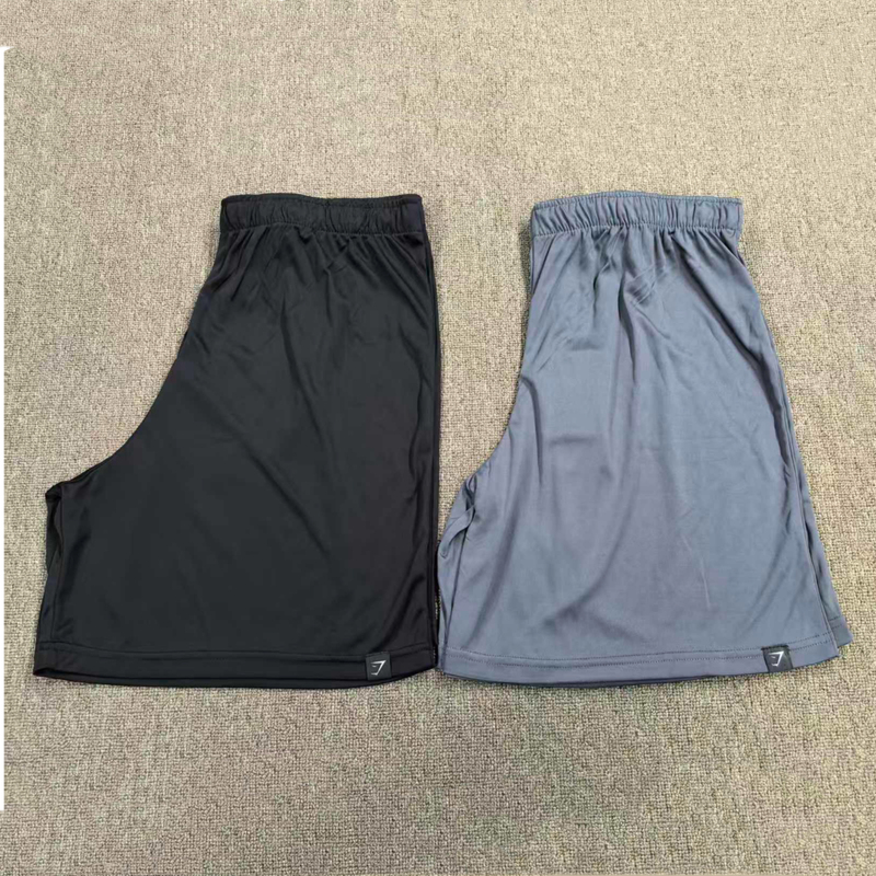 Gymshark Trainning Comprehensive Training Shorts for Men and Women, American Style Sports Loose Quick-Drying Breathable Five-Point Shorts Gymshark Trainning Comprehensive Training Shorts for Men and Women, American Style Sports Loose Quick-Drying Breathable Five-Point Shorts