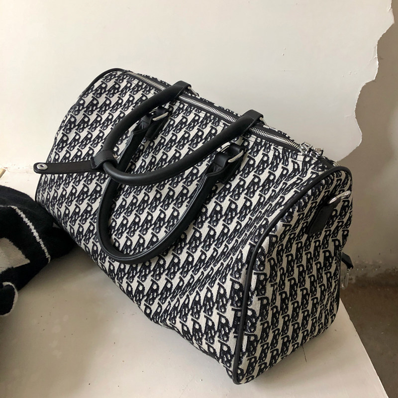 Canvas embroidered travel bag women's large capacity short trip boarding bag luggage bag net red fashion handbag