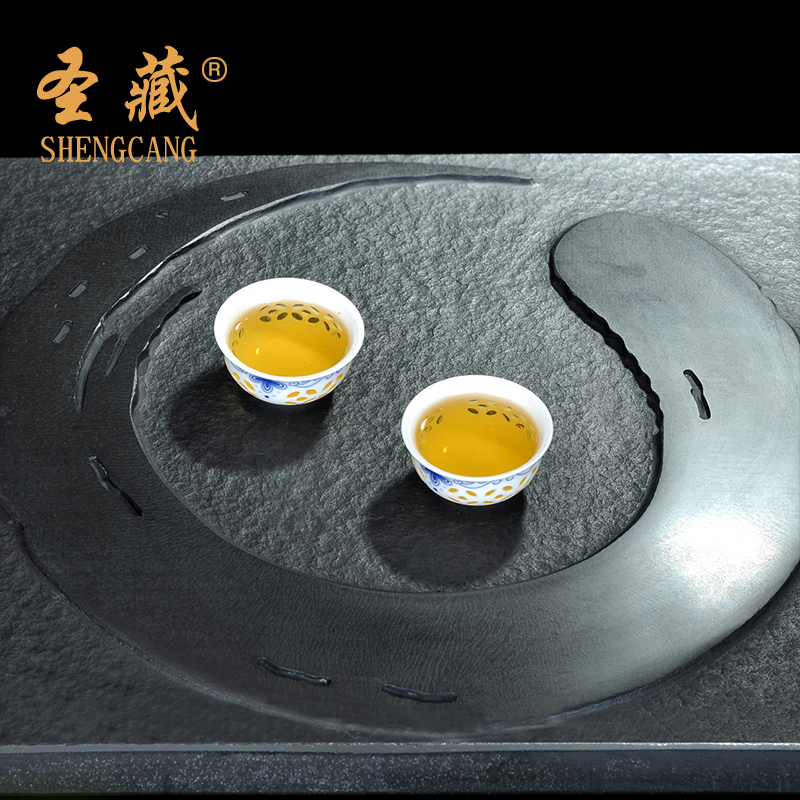 A complete set of exquisite time tea service suit hollow ceramic kung fu tea cup lid to use simple Chinese style is contracted with tea