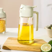 Двухцелевое стеклянное масляное горшок Кухня Домохозяйственная утечка масла Антиочинка банки с распылением.