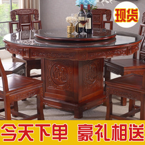 All solid wood dining table and chair combination round antique carving flower belt turntable new Chinese style 10-person Oak household dining table round table