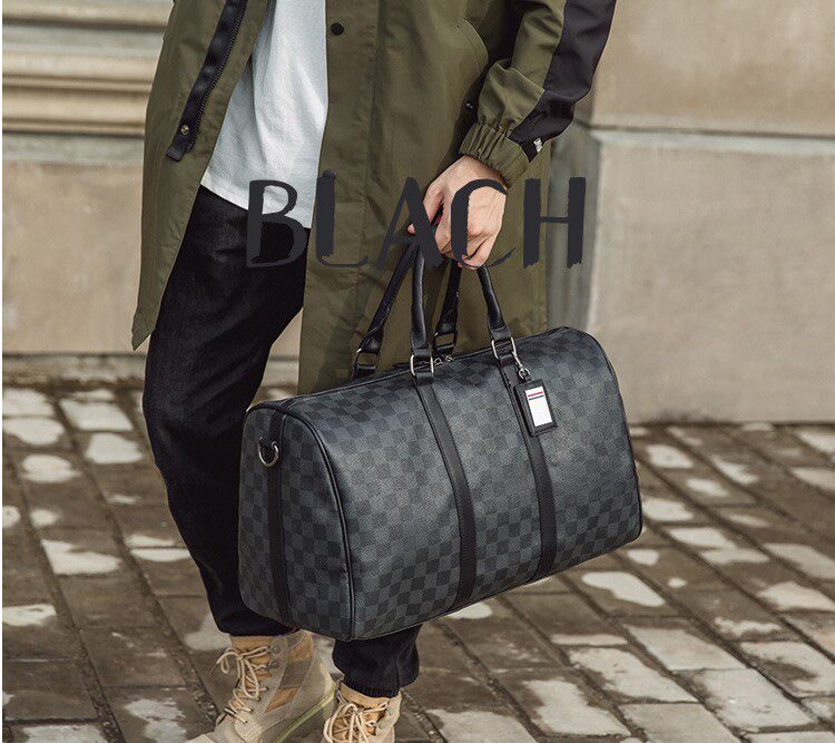 Hong Kong cowhide travel bag for men and women's new large-capacity tide short-distance Korean version of the plaid handbag shoulder bag