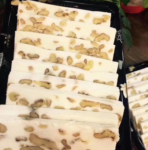 The walnut cloud cake of the old Suzhou series is full of walnuts combined with high-quality glutinous rice, soft and delicate