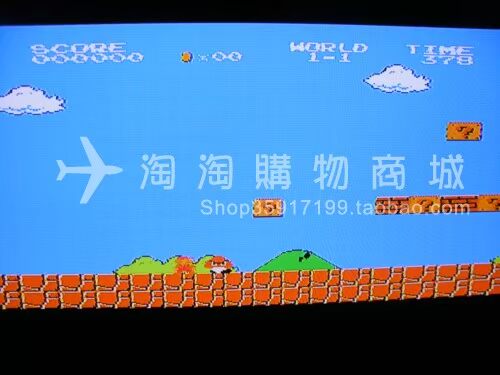 Miễn phí vận chuyển! Máy bay chiến đấu D99 chính hãng nhỏ Máy chơi trò chơi Nintendo màu đỏ và trắng FC TV trò chơi Super Mario - Kiểm soát trò chơi tay cầm ps3