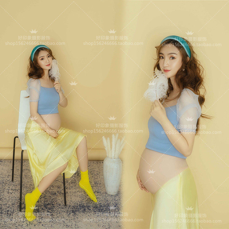 New fresh suit of snow white pregnant woman photography photography theme clothing photography photography photography
