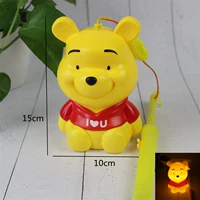 Музыкальный фонарь вини медведь