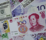 人民币兑美元即期收盘微升，早盘曾短暂触及6.5732元的三周来新高；中间价则小幅调整。交易员表示，中国十九大召开前气氛总体偏多。新出炉的中国9月贸易数据向好