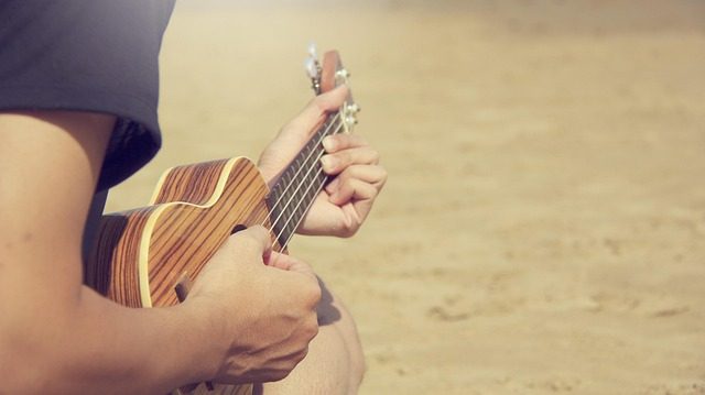 how to attach a guitar strap to an acoustic guitar