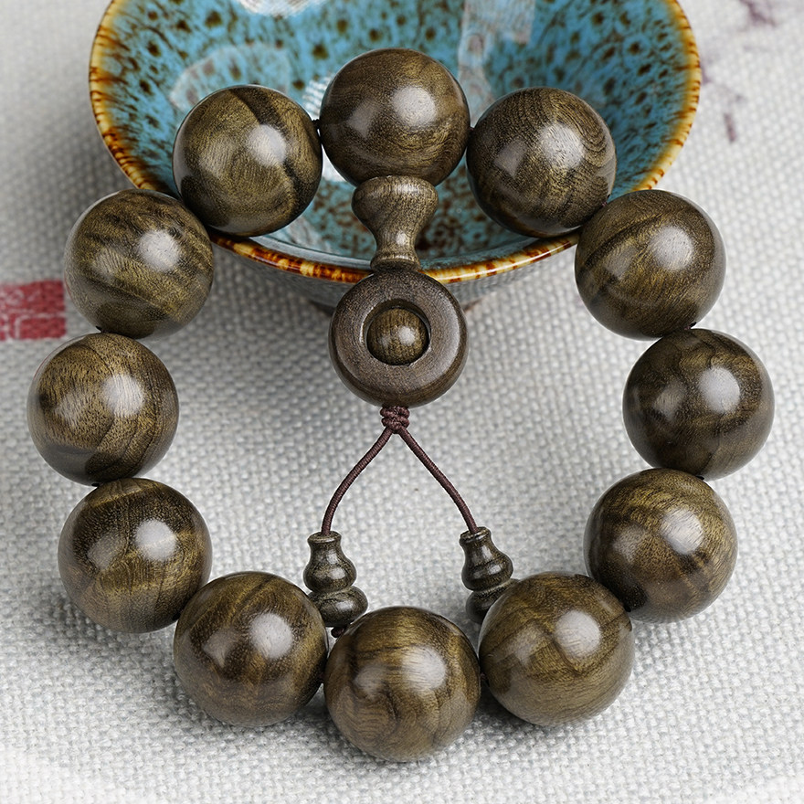 Pick up the drain (water ripple) golden silk Nangyin Dark Wood 20mm Buddha Pearl Handstring Little Ye Zhennan