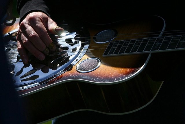 how do you attach a strap to an acoustic guitar