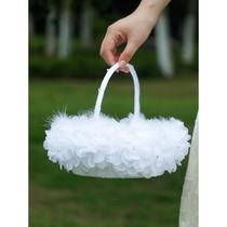 Wedding flower girl scatters flowers in a basket with petals and rings wedding holiday party dance decoration hand-held flower basket