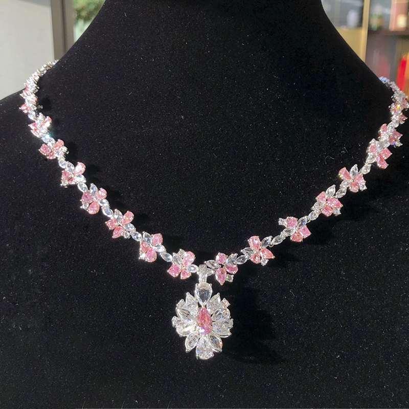 The Main Diamond Weighs 11.529 Carats, the Secondary Diamond Weighs 13.613 Carats, and the Luxurious 18K Gold Waterdrop Pink Diamond Necklace