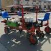 Diesel tractor-pulled pepper, tomato, lettuce and cabbage transplanting machine, rotary tillage, ridging, drip irrigation and film covering