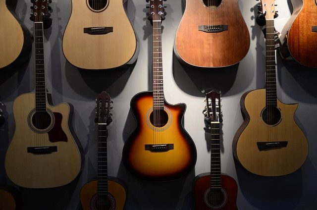 how do i string an acoustic guitar