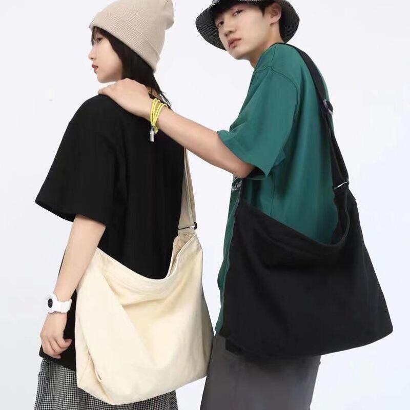 2026 New Style Ins Retro Messenger Canvas Bag Simple Large Capacity Unisex Commuter Crossbody Bag 2026 New Style Ins Retro Messenger Canvas Bag Simple Large Capacity Unisex Commuter Crossbody Bag